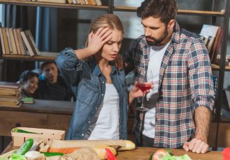 Young couple quarrel, upset girl talking to boyfriend
